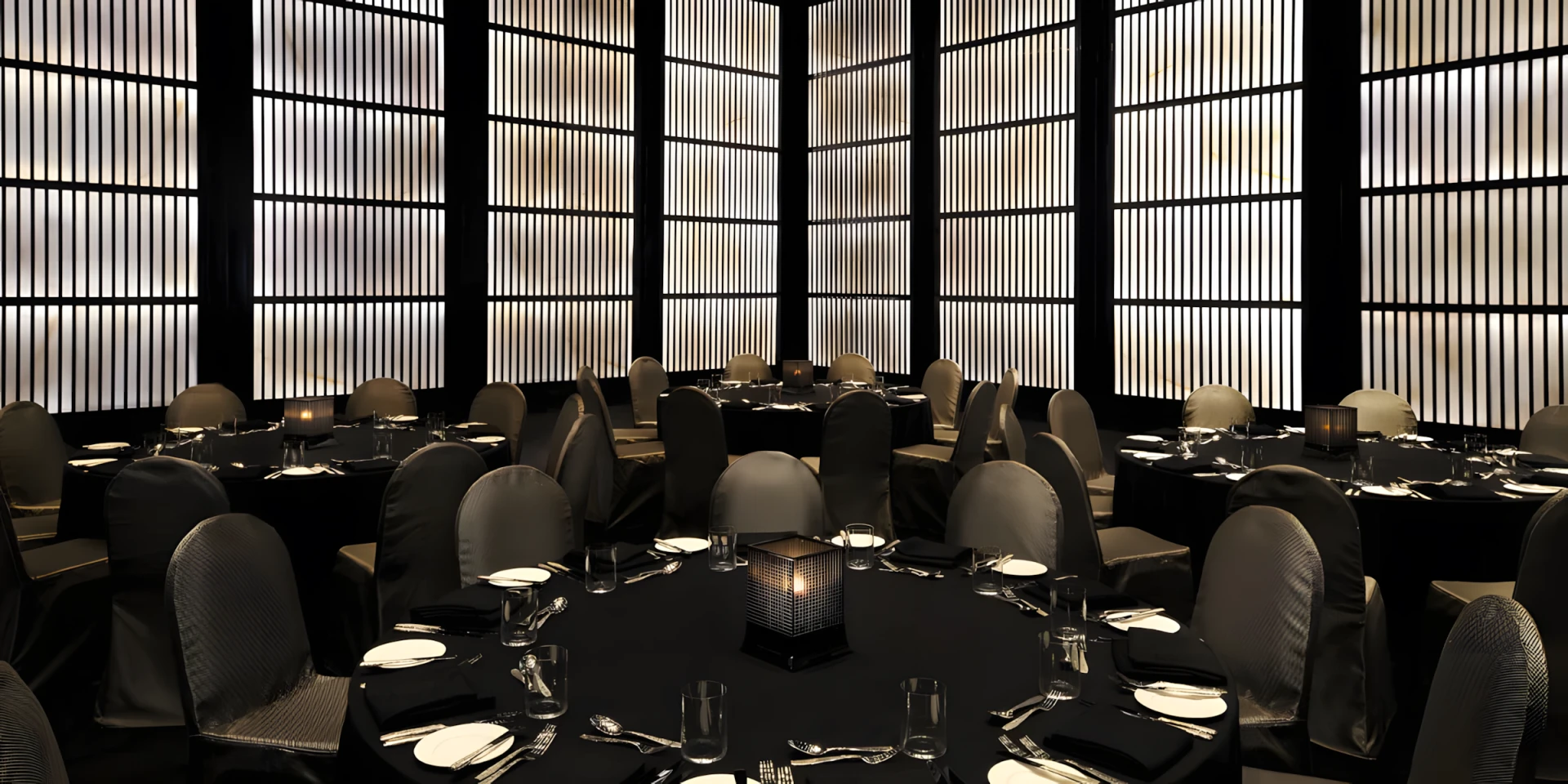Elegant ballroom at Armani Hotel Dubai, Burj Khalifa, with round tables.