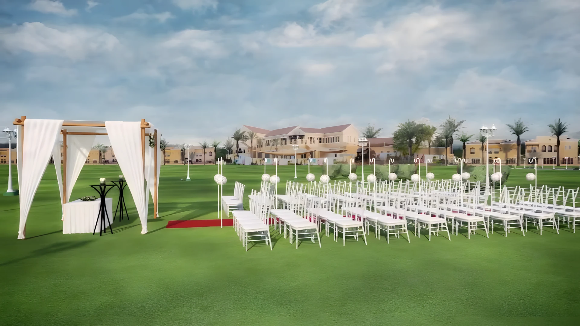 Ceremony setup on green lawn at Dubai Polo & Equestrian Club.