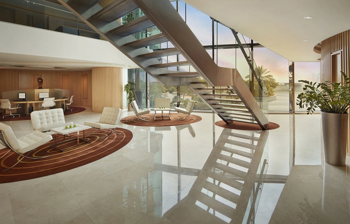 Modern business center lobby at The Meydan Hotel, Dubai.