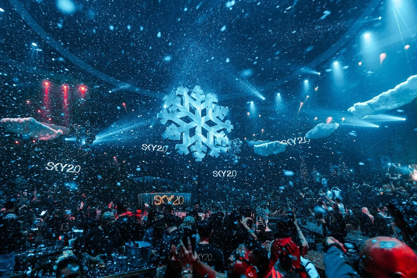Sky2.0 Dubai nightclub with snowflake decor and vibrant lighting.