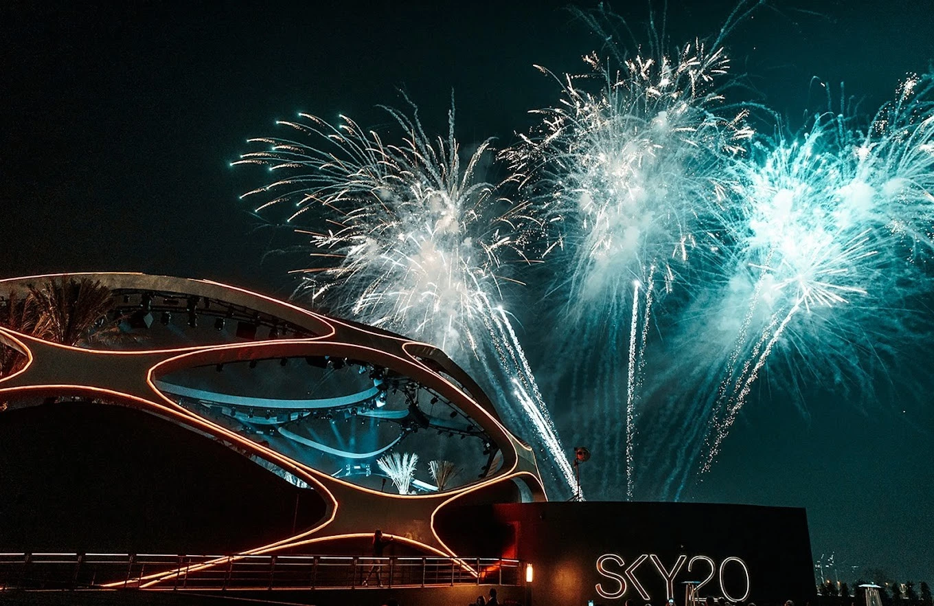 Fireworks above Sky2.0 Dubai venue at night.