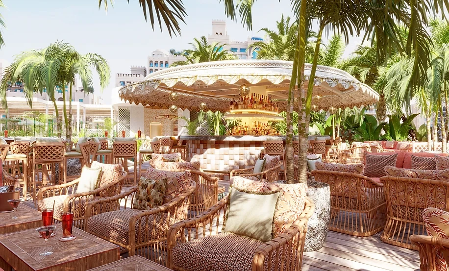 Tropical outdoor seating at Maison de La Plage, Dubai.