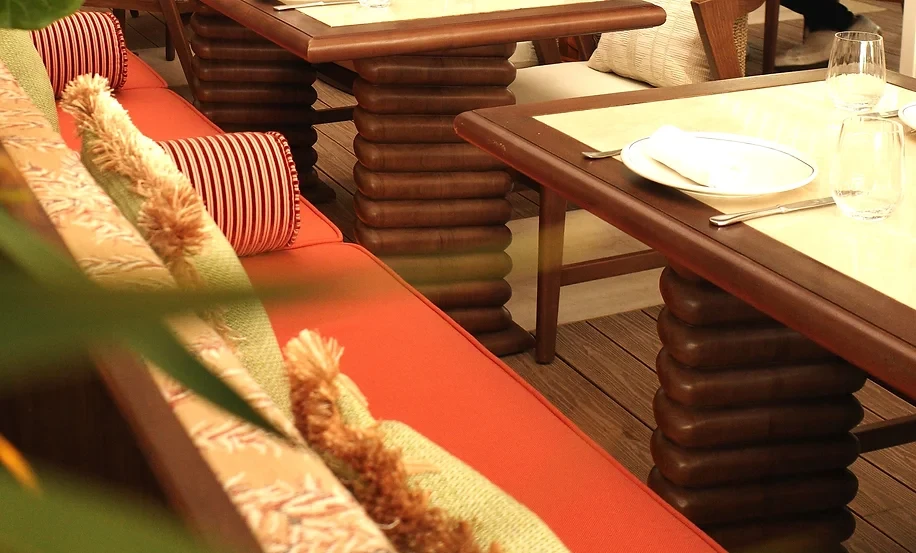 Maison de La Plage dining area with elegant table settings, Dubai.