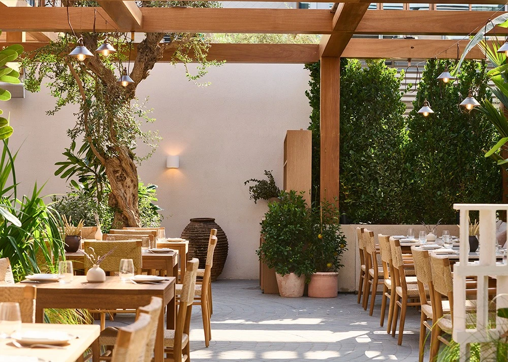 Sunny patio dining at Mythos Urban Greek Eatery, Dubai.