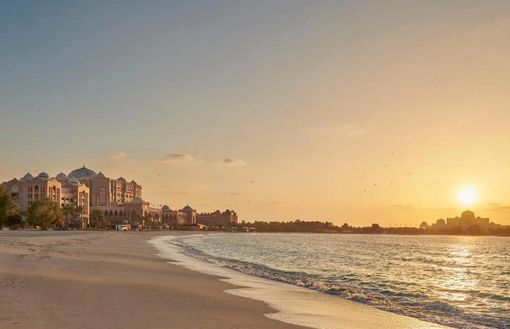 Sunset view of Emirates Palace Mandarin Oriental, Abu Dhabi beach.