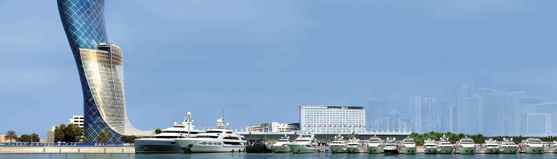 ADNEC Centre Abu Dhabi with yachts docked nearby.