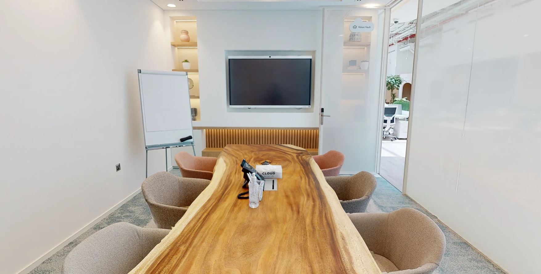 Meeting room at Cloud Spaces Circle Mall Dubai with wooden table.