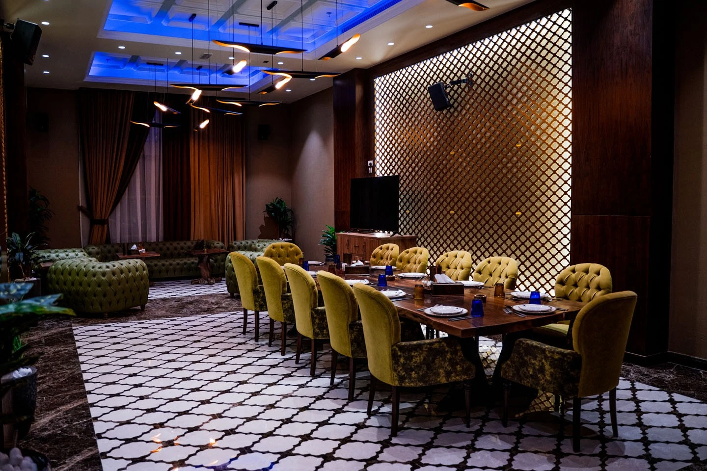 Elegant dining area at Al Meshwar Restaurant, Dubai with plush seating.