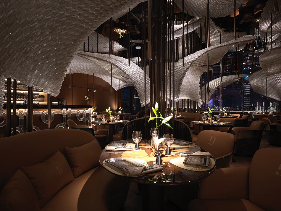 Elegant interior of Doors Dubai Mall Restaurant with artistic ceiling design.
