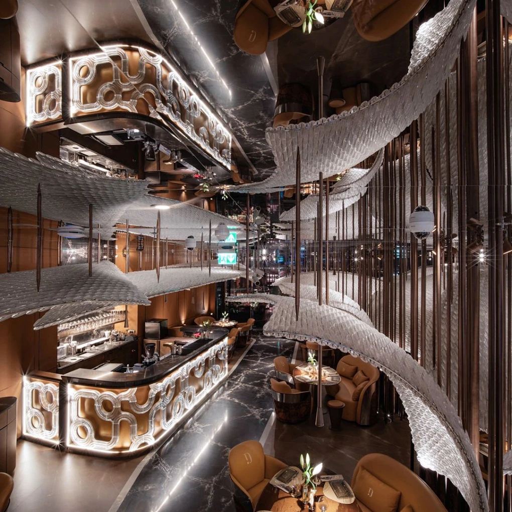 Contemporary interior with illuminated bar at Doors Dubai Mall Restaurant.