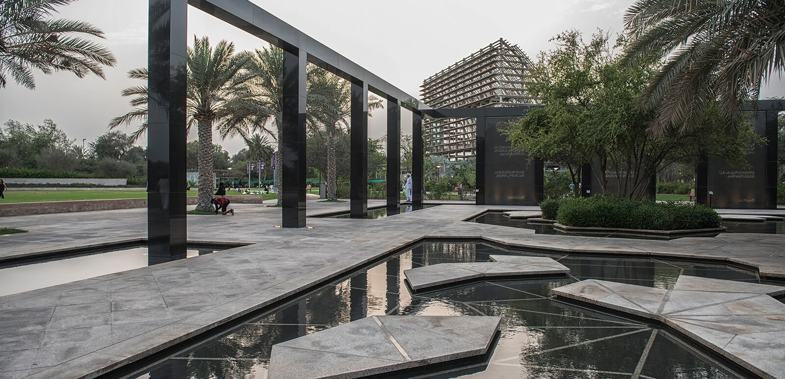 Modern garden with geometric water features, Umm Al Emarat Park, Abu Dhabi.