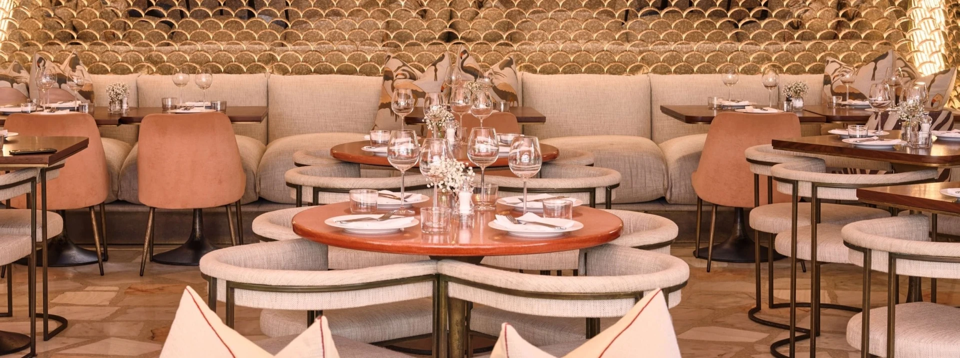 Elegant dining setup at Flamingo Room by tashas, Abu Dhabi.