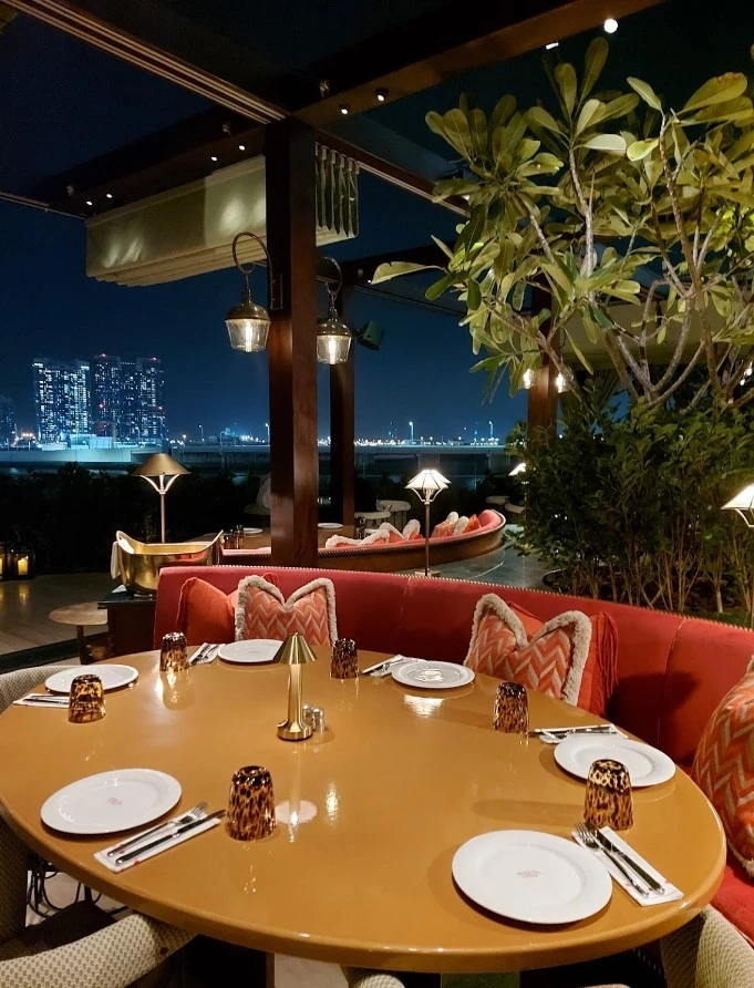 Elegant outdoor dining at Flamingo Room by tashas, Abu Dhabi.