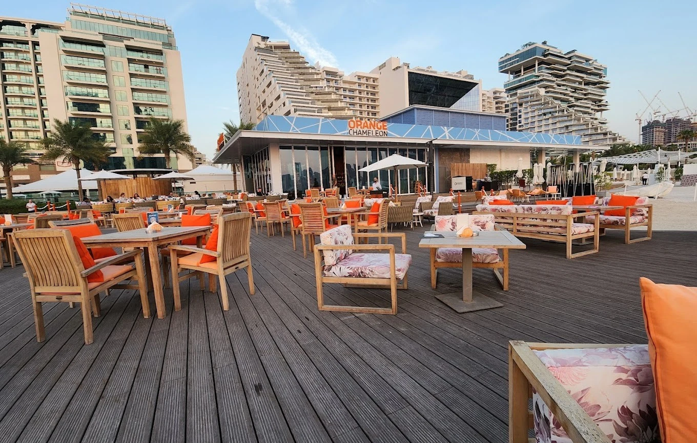 Outdoor seating at Orange Chameleon Restaurant & Lounge, Dubai.