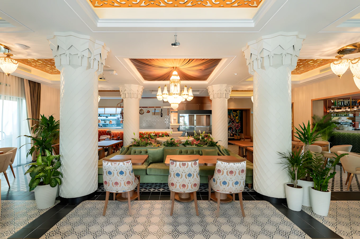 Elegant interior of Grand Zor Restaurant Dubai with ornate columns.