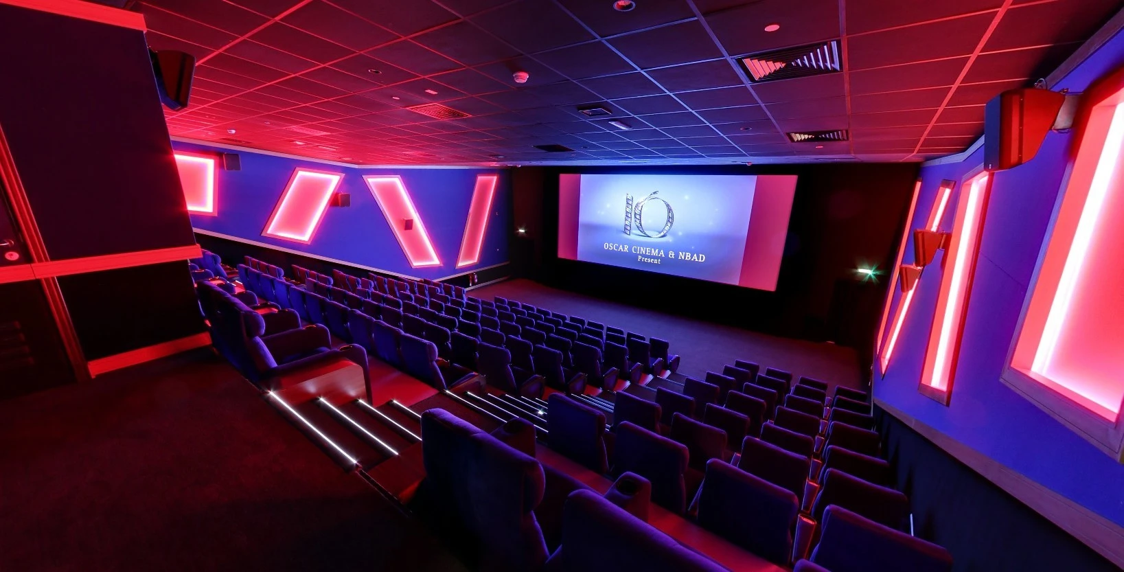 Star Cinema Barari Outlet Mall theater in Al Ain with neon lights.