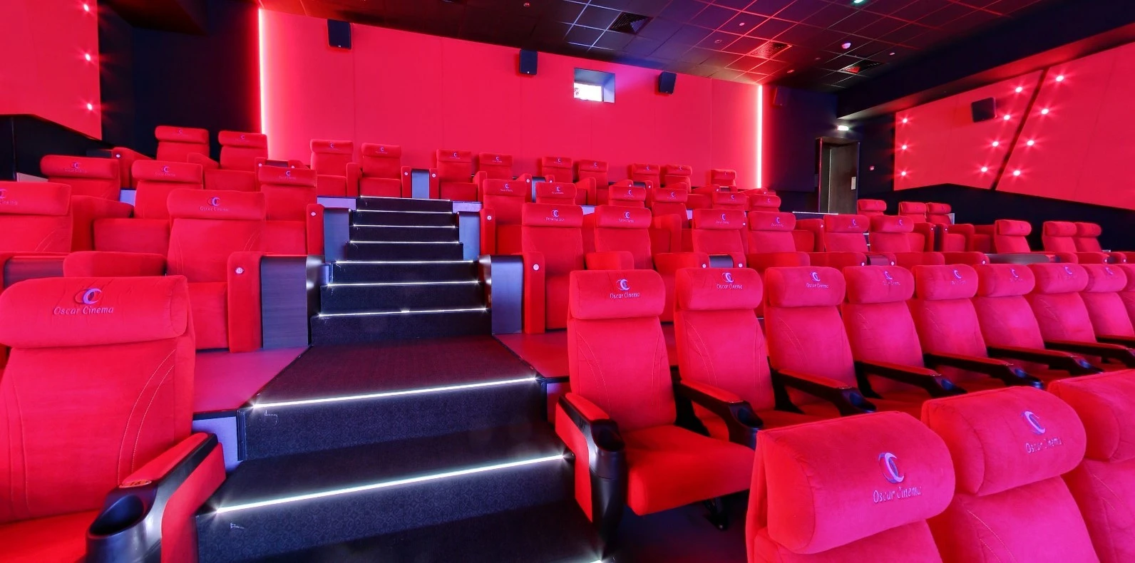 Red seats in Star Cinema Barari Outlet Mall, Al Ain.