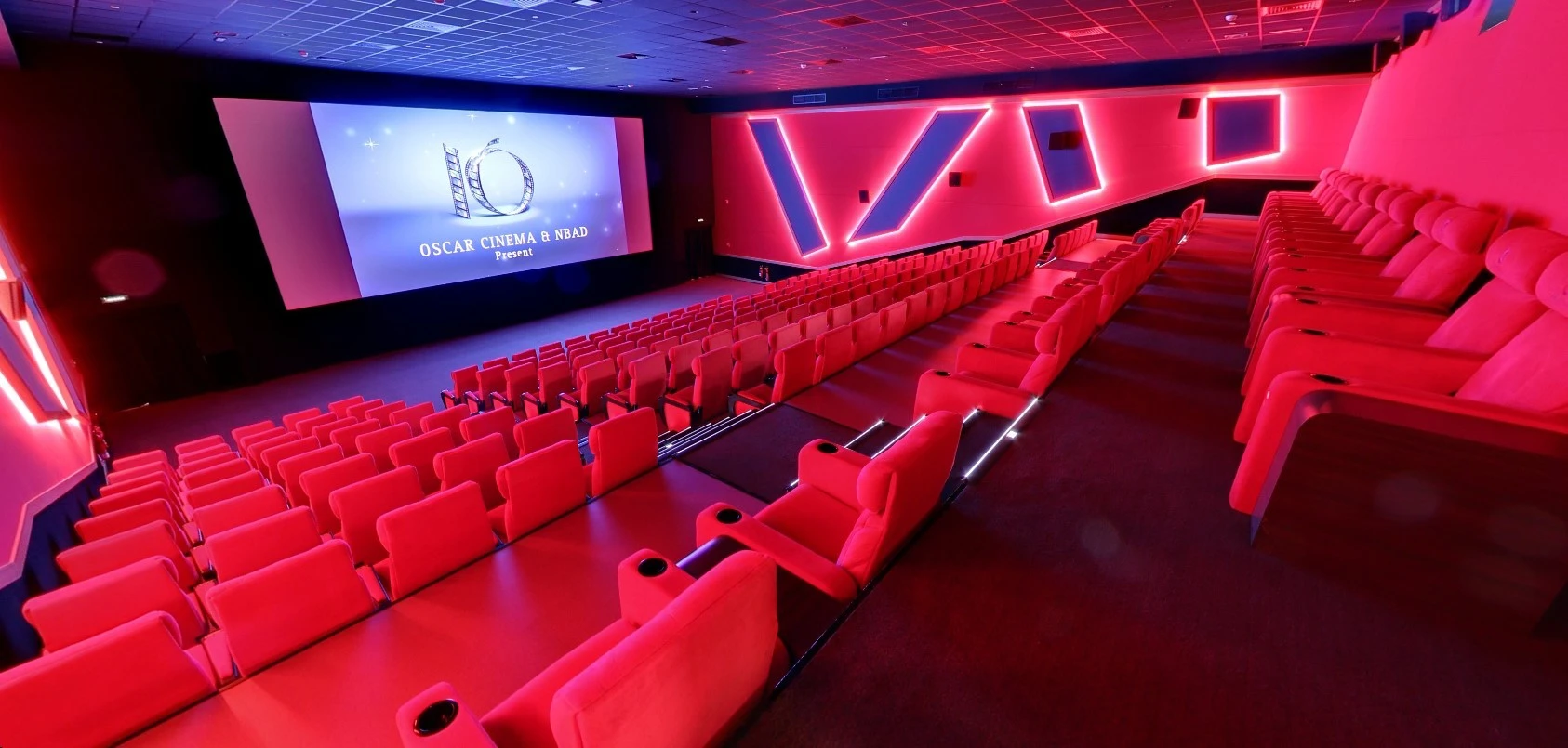 Star Cinema Barari Outlet Mall theater with red seating, Al Ain.