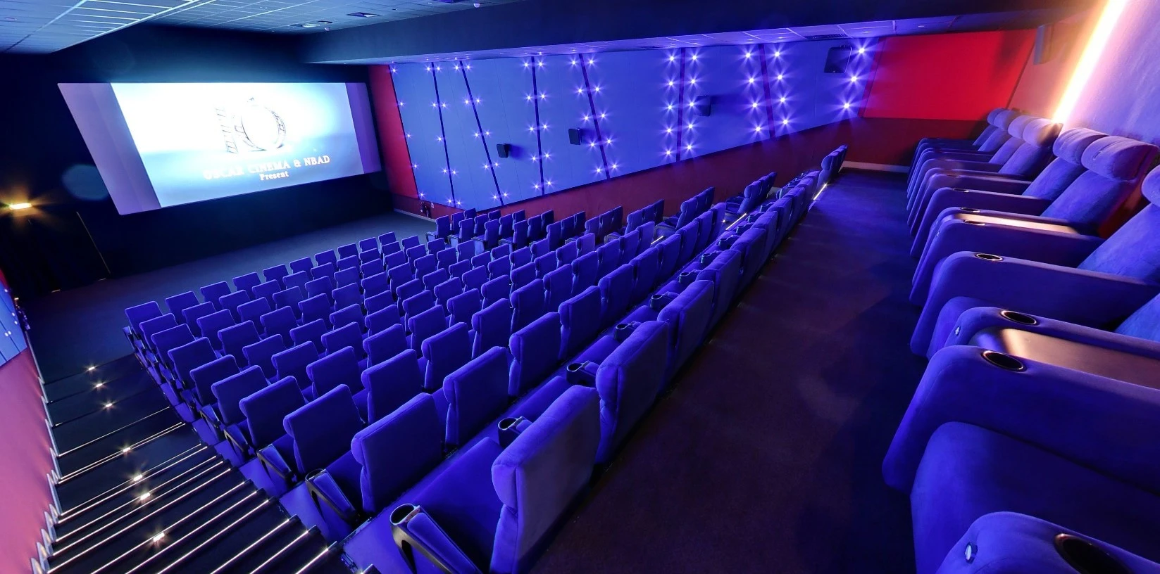 Star Cinema auditorium with blue seats, Al Ain Barari Outlet Mall.