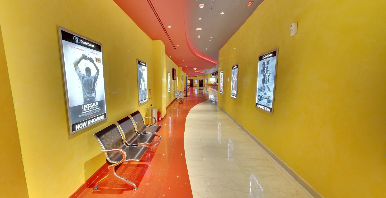 Bright hallway with movie posters, Star Cinema Barari Outlet Mall, Al Ain.