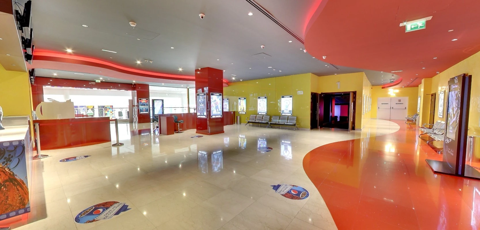Bright lobby of Star Cinema Barari Outlet Mall, Al Ain.