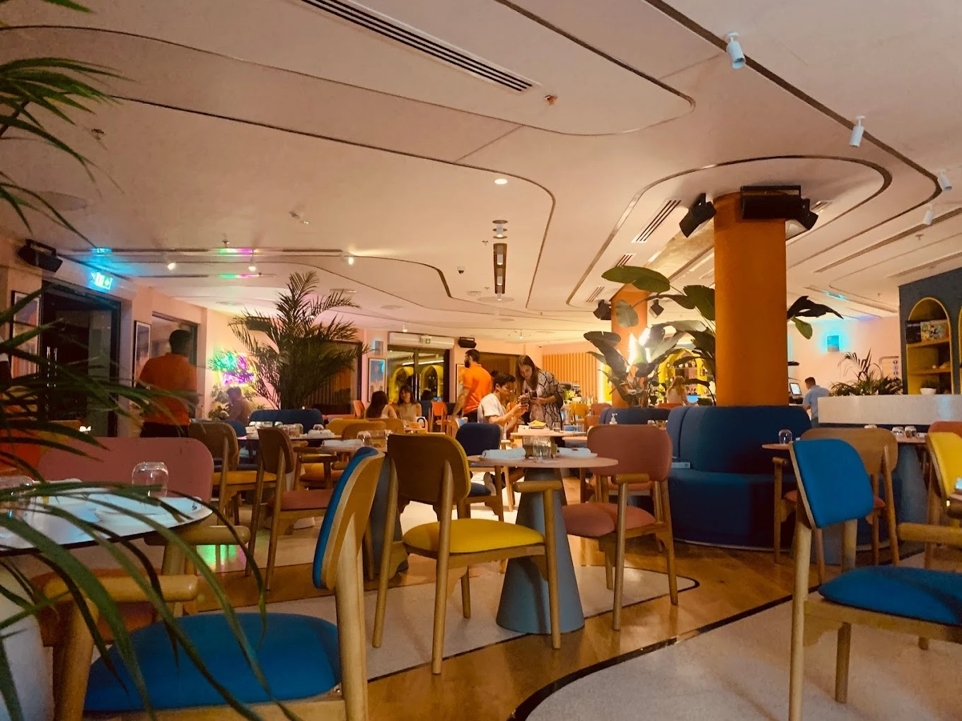 Colorful interior of Peaches & Cream Beach Restaurant, Dubai.