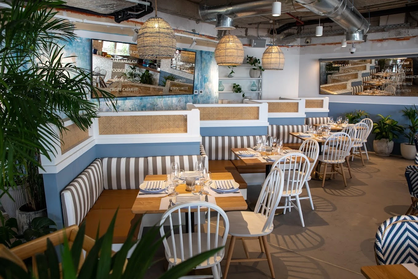 Cozy dining area at The Byron Bathers Beach Club, Dubai.