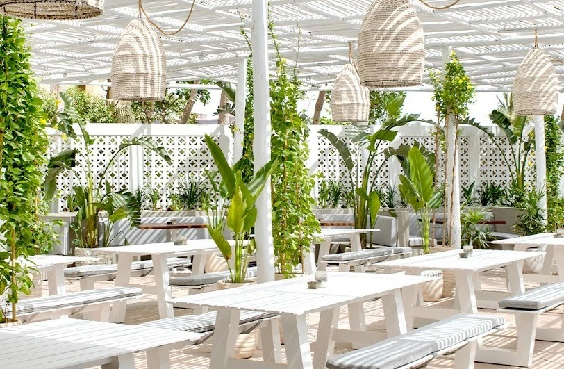 Outdoor seating at The Byron Bathers Beach Club, Dubai.