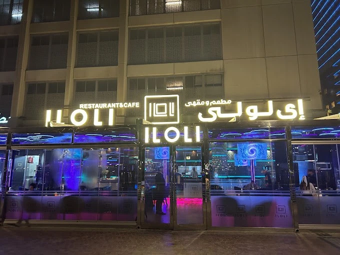 ILOLI Restaurant entrance with vibrant lights, Dubai Marina Walk.