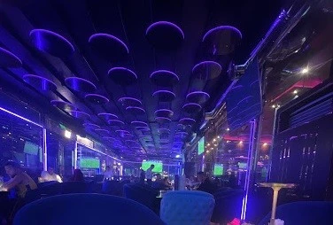 ILOLI restaurant interior with purple lighting, Dubai Marina Walk.