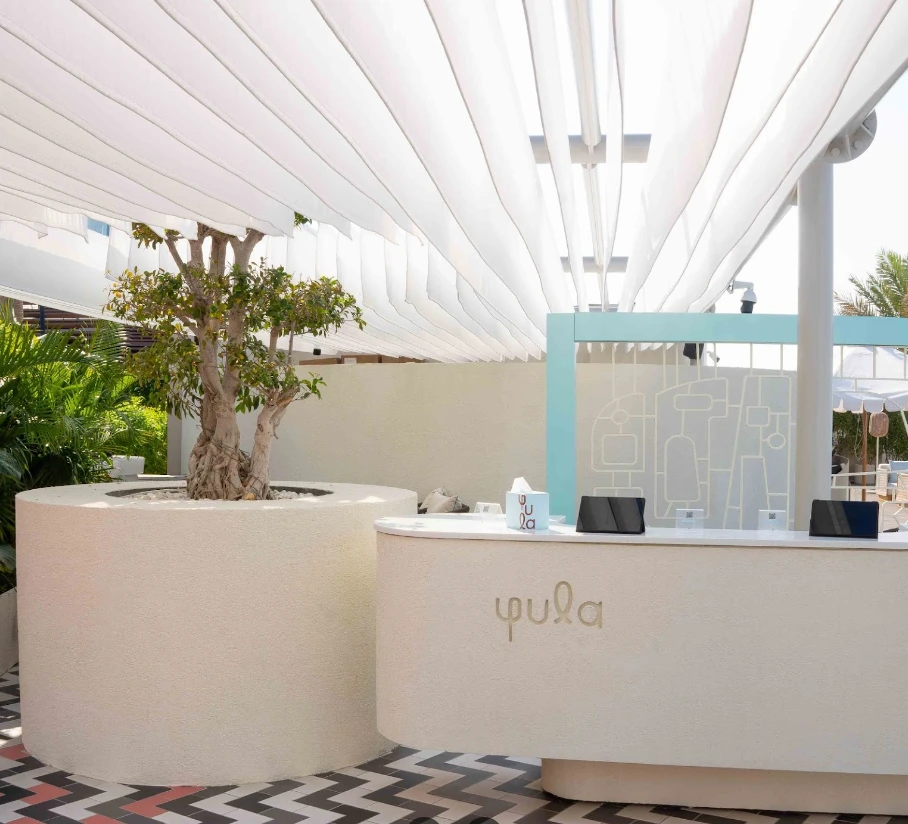 Yula Lounge reception area with modern decor, Dubai.