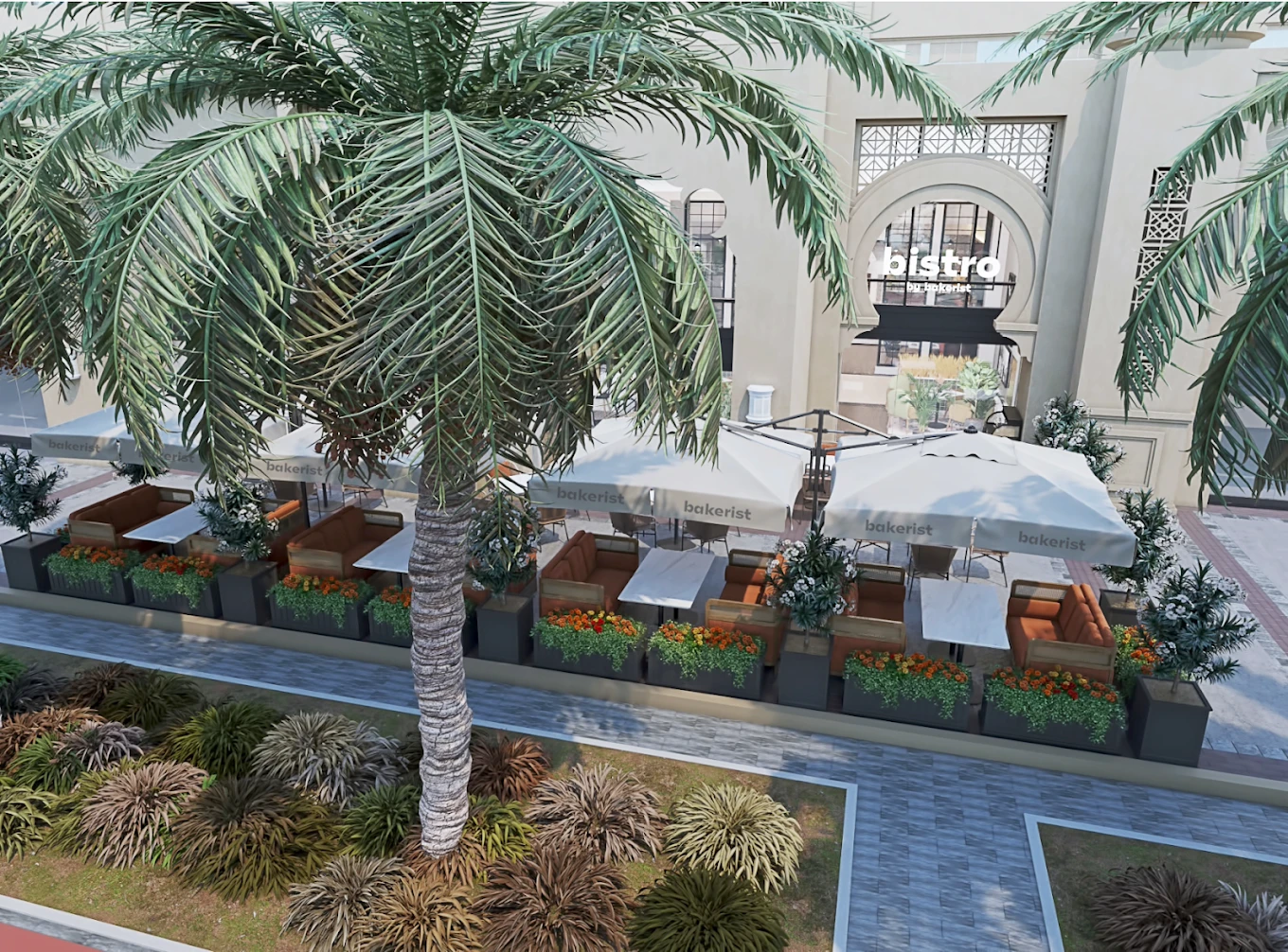 Outdoor seating at Bakerist The Palm Jumeirah, Dubai with palm trees.