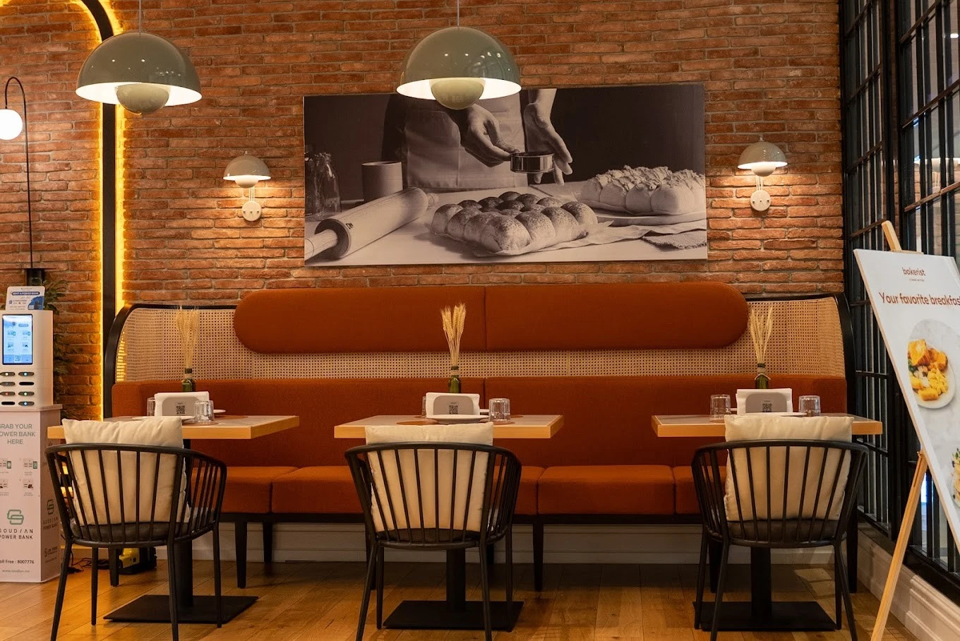 Cozy seating at Bakerist The Palm Jumeirah, Dubai with warm lighting.