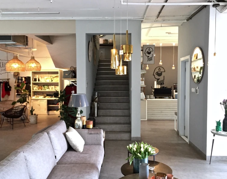 Modern interior of Fiks Coffee Umm Suqeim, Dubai with cozy seating.