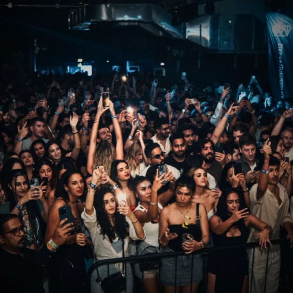 Crowd enjoying event at P7 Arena, Dubai, lively atmosphere.