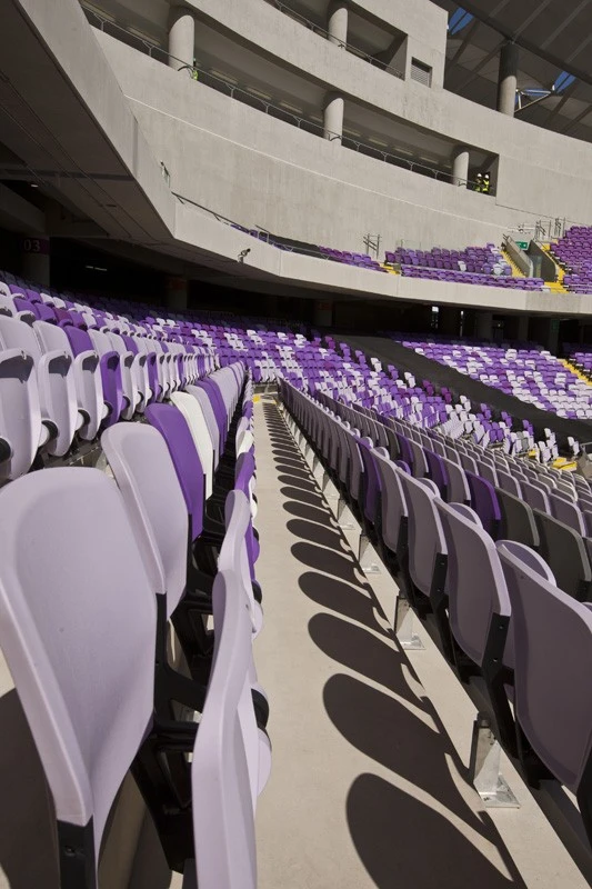 Purple and gray seats at Hazza Bin Zayed Stadium, Al Ain.