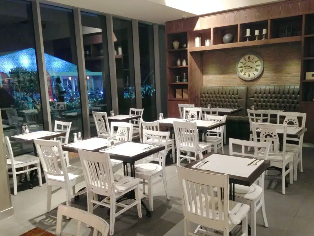 Cozy dining area at Eggspectation Restaurant Cafe, Dubai Marina.