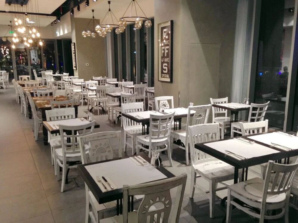 Empty dining area at Eggspectation Restaurant Cafe, Dubai Marina.