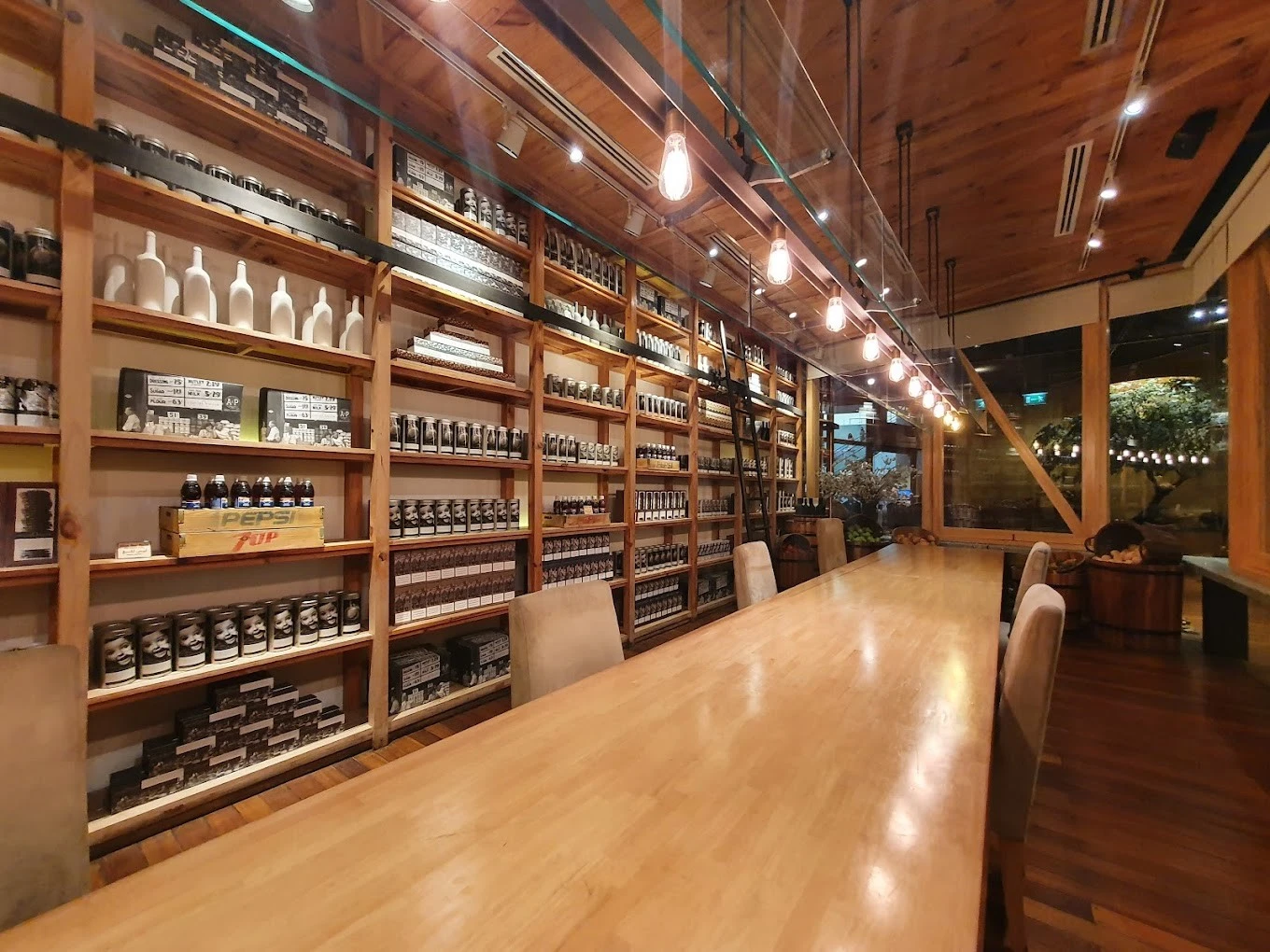 Rustic dining area in Social House Restaurant, Dubai with wooden shelves.
