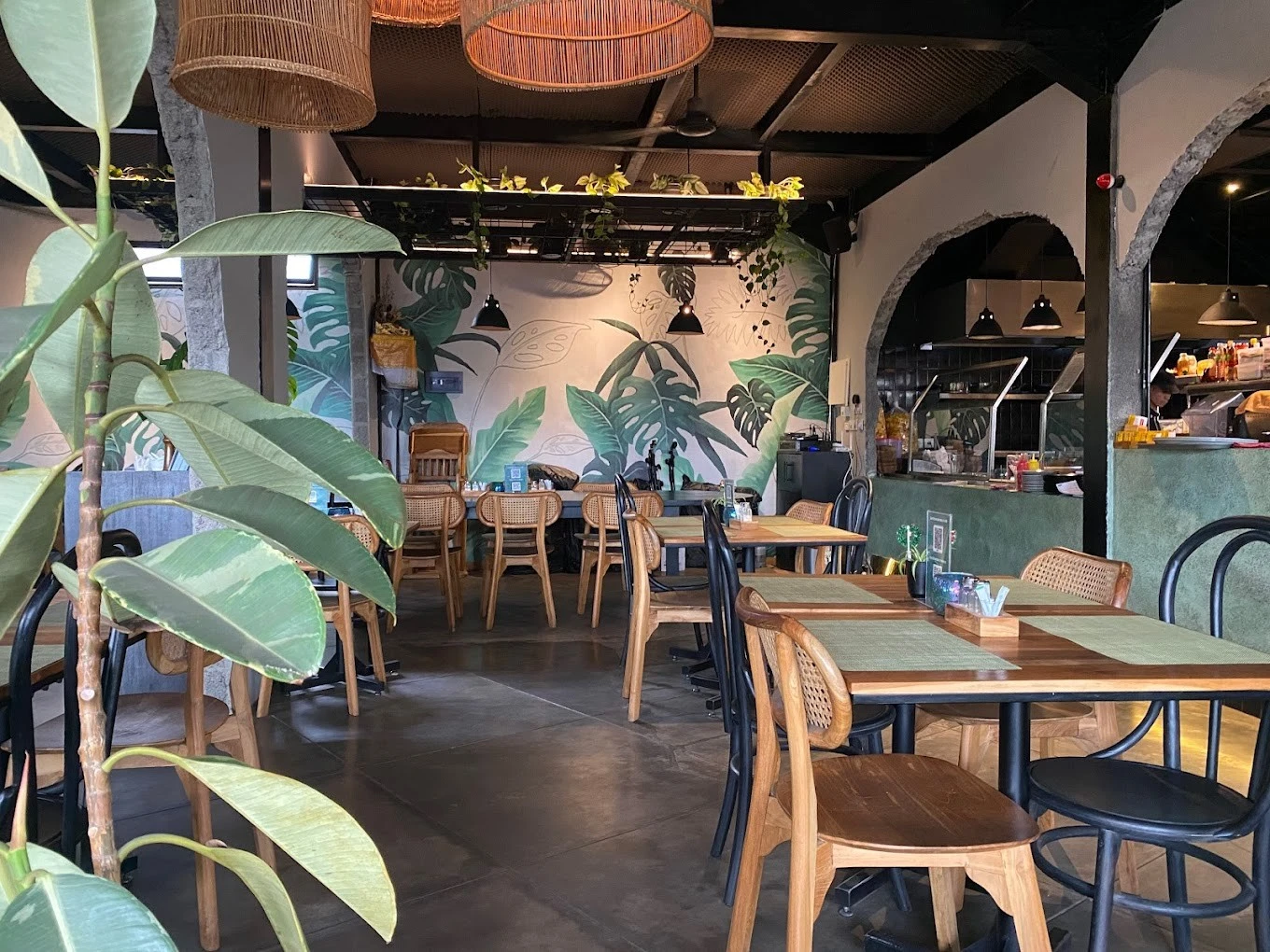 Cozy interior of Social House Restaurant, Dubai with tropical decor.