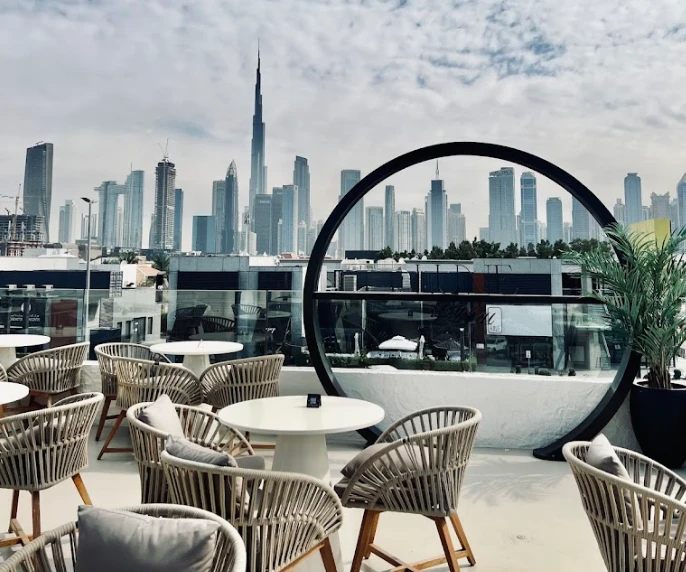 Lune Lounge rooftop with Dubai skyline view, featuring Burj Khalifa.