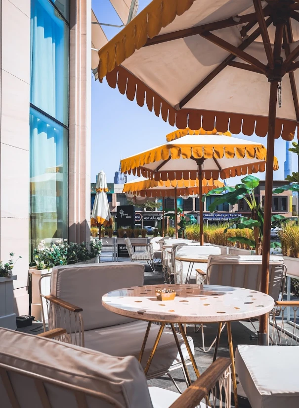Sunny outdoor terrace at Brunch & Cake Wasl 51, Dubai.