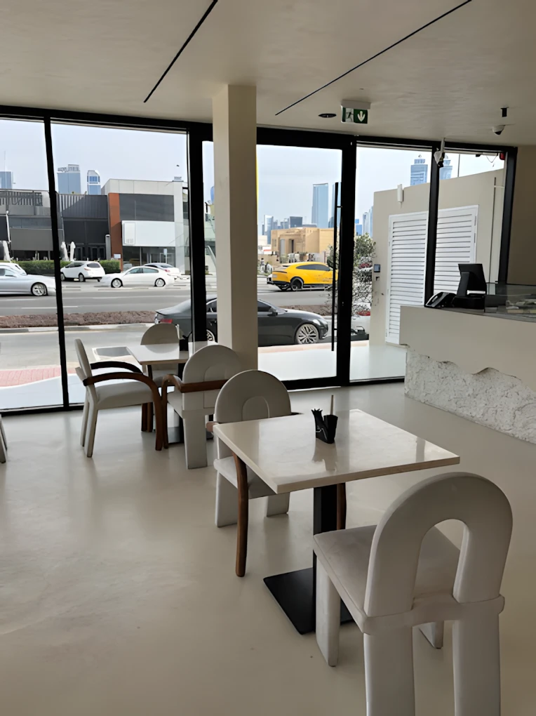 Modern interior of Lune Lounge, Dubai with city view.