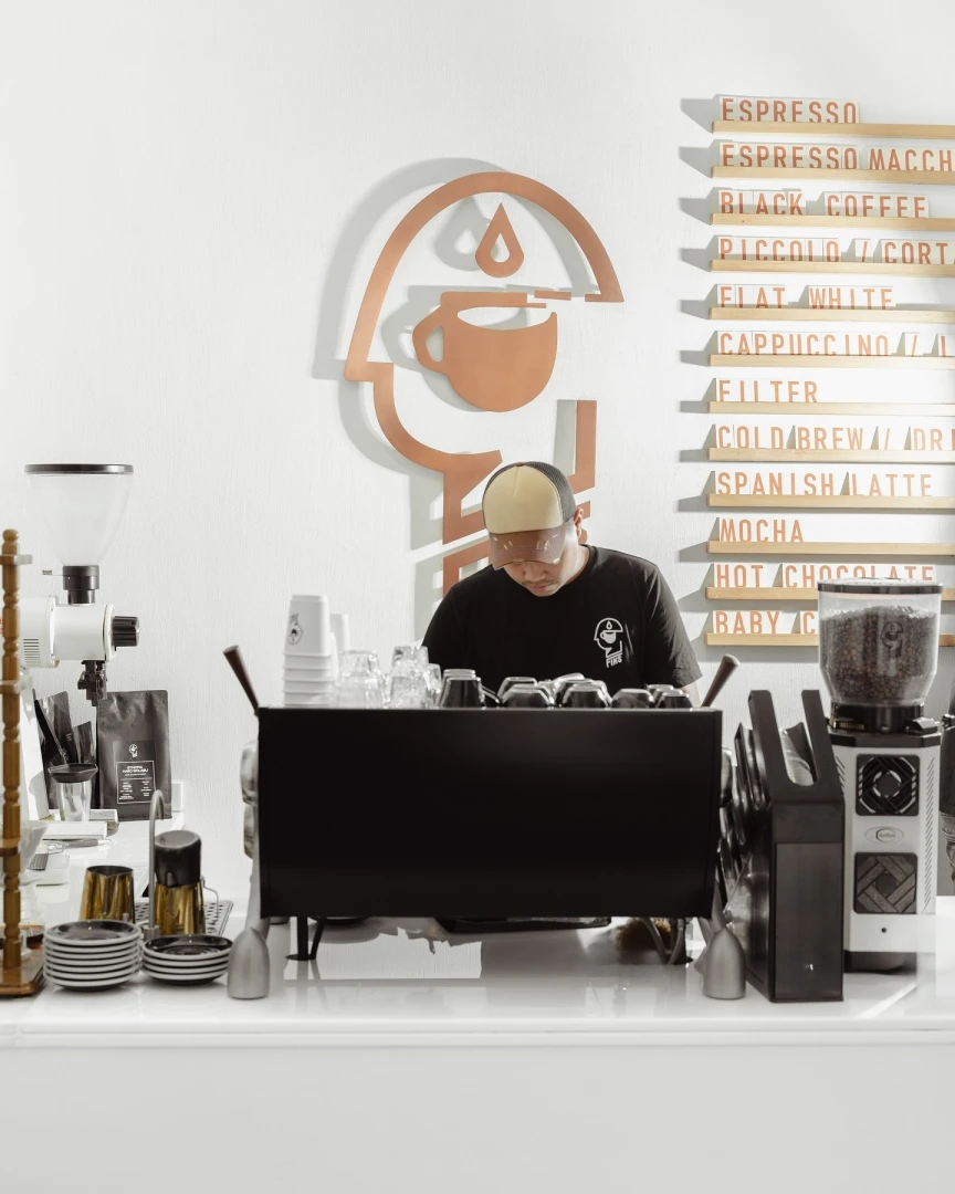 Barista working at Fiks Coffee Umm Suqeim, Dubai.