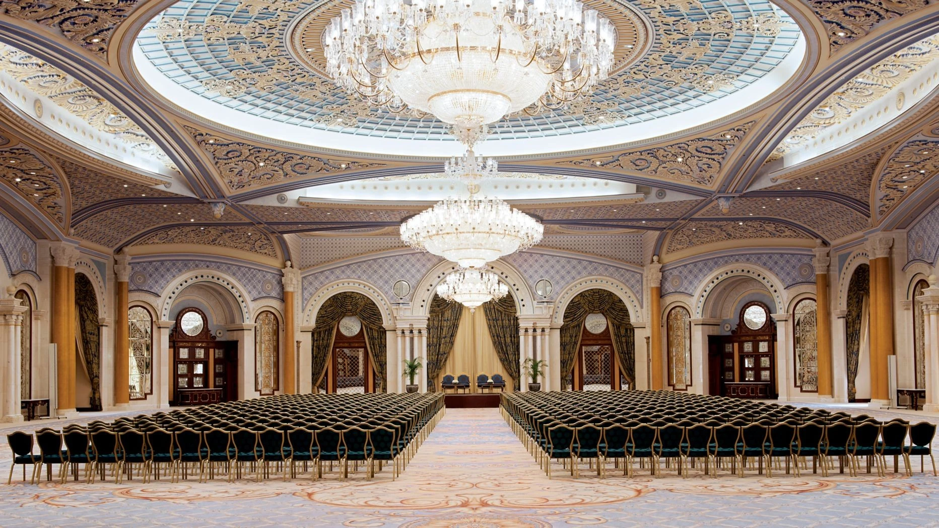 Elegant ballroom with chandeliers at The Ritz Carlton Riyadh.