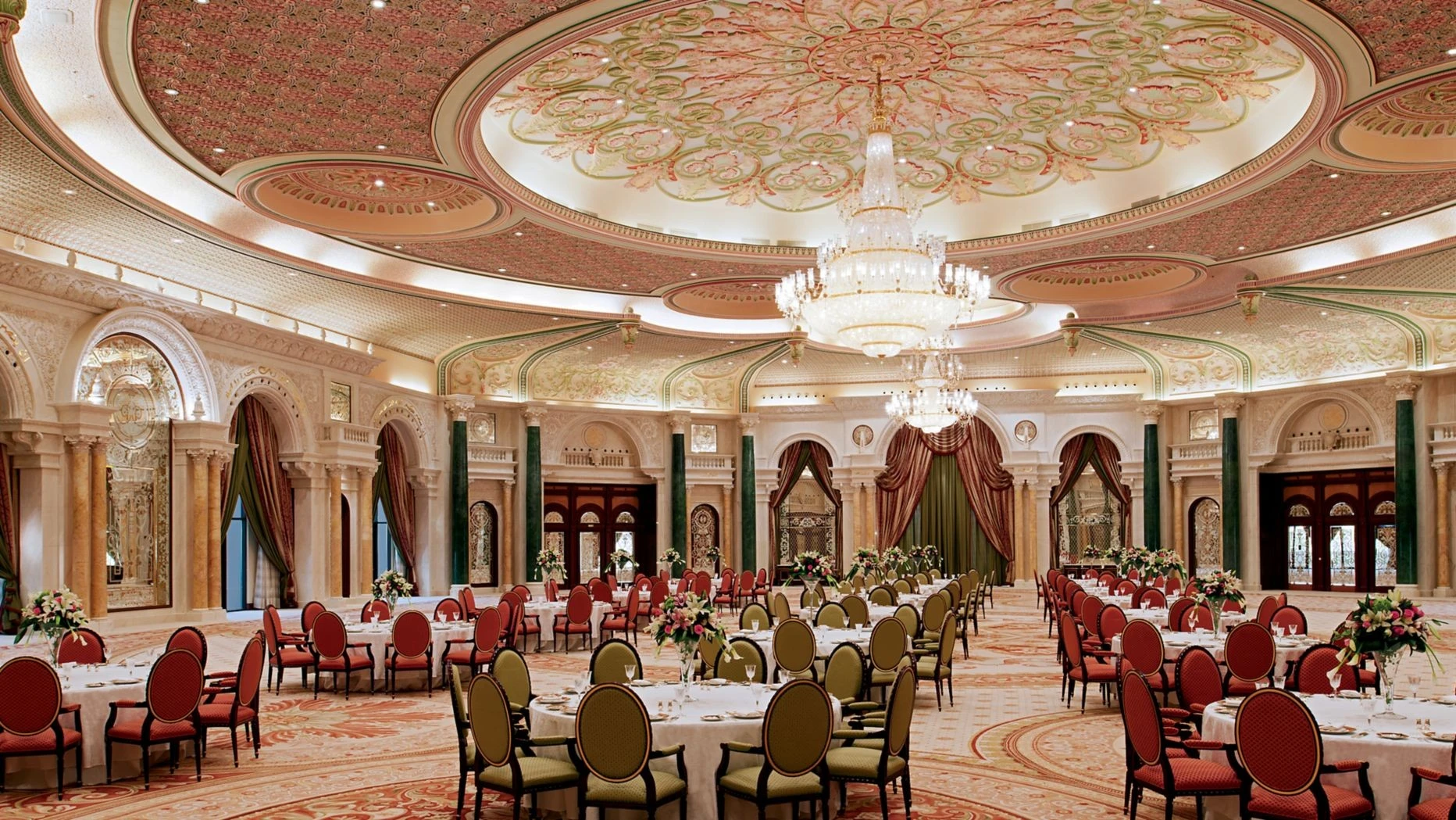 Ornate ballroom with floral decor at The Ritz Carlton Riyadh.