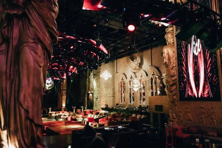 Luxurious interior of Vice Night Club Downtown Dubai with chandeliers.
