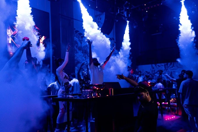 Crowded nightclub with smoke effects, Secret Room Downtown Dubai.