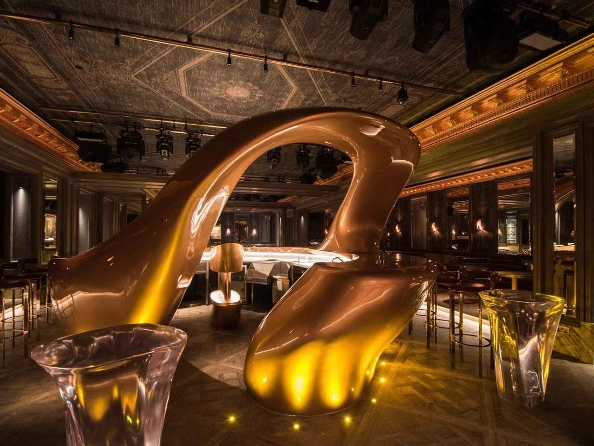 Luxurious interior of Secret Room Downtown Dubai with golden decor.