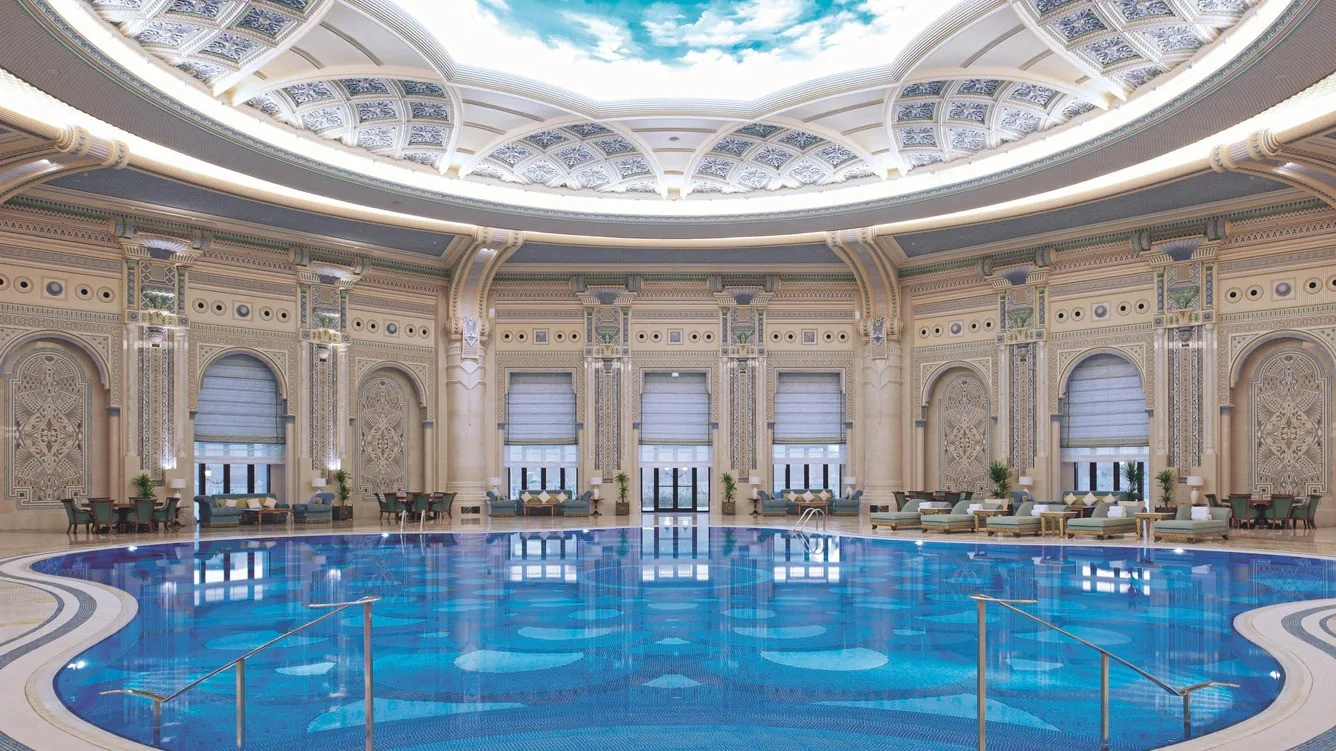 Ornate indoor pool with domed ceiling, The Ritz Carlton Riyadh.